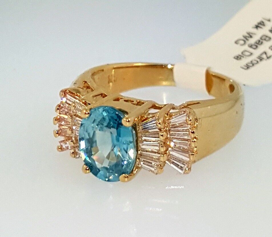 OVAL BLUE ZIRCON and BAGUETTE DIAMONDS RING 2.12 ctw, 14k Yellow Gold, Size 4.75