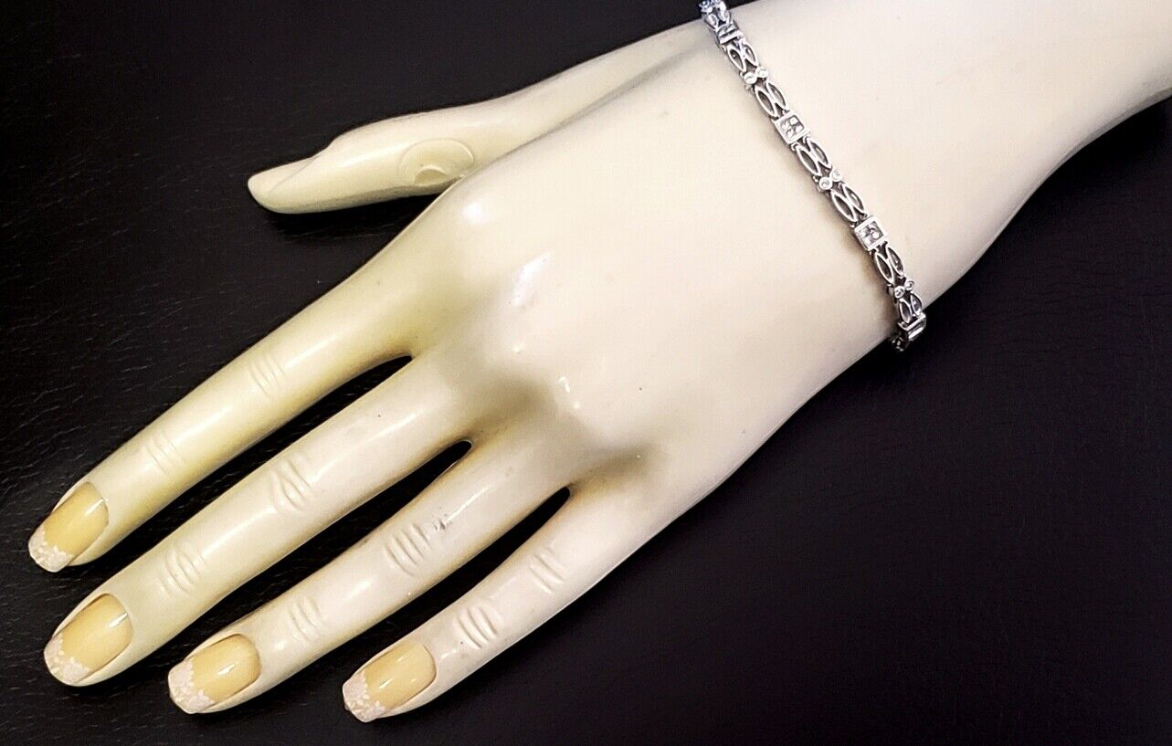 Vintage 18kt white Gold invisible square Diamond Filigree Tennis Bracelet 7"